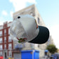 RICH BANKS WHITE AND BLACK TRUCKER HAT
